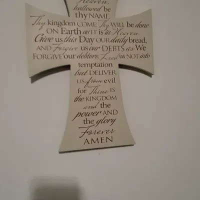 Sale Photo Thumbnail #122: Cross-shaped wooden wall plaque featuring the text of The Lord's Prayer in decorative script.