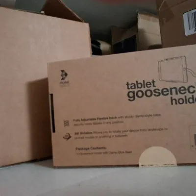 Sale Photo Thumbnail #103: Boxed CTA Digital tablet gooseneck holder with flexible arm and clamp base alongside other boxed electronics and storage items.