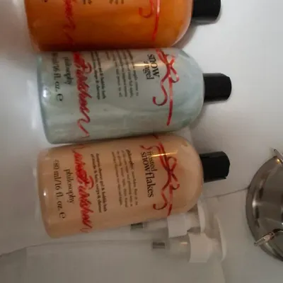 Sale Photo Thumbnail #101: Trio of Philosophy 16 fl oz 3-in-1 shampoo, shower gel, and bubble baths, including Morning Maple, Snow Angel, and Frosted Snowflakes scents.