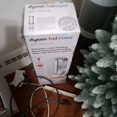 Sale Photo Thumbnail #124: Dyson Hot + Cool Jet Focus fan heater, shown alongside its original retail packaging box.