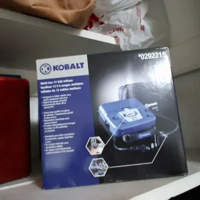 Sale Photo Thumbnail #105: Kobalt multi-use 12-volt air inflator, model #0292215, in its original retail box.