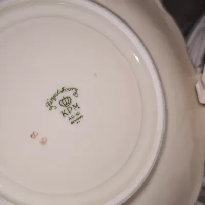 Sale Photo Thumbnail #203: Maker's mark on the underside of a Royal Ivory KPM Germany porcelain dish.