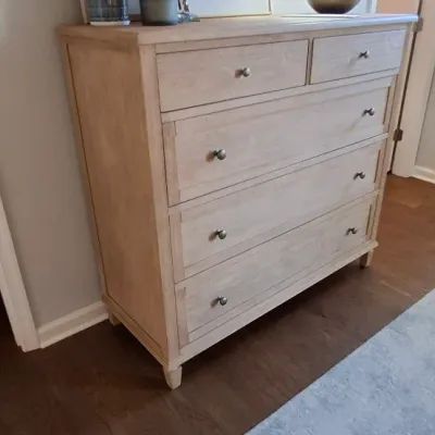 Sale Photo Thumbnail #42: Contemporary light oak tall chest of drawers with round metal knobs, featuring two small upper drawers over four wide drawers.