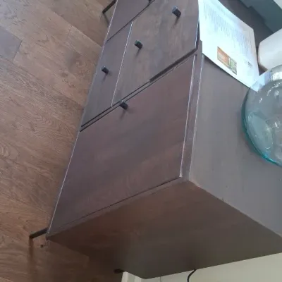 Sale Photo Thumbnail #14: Modern dark wood storage cabinet featuring asymmetric drawers and doors with slim black metal legs, shown with a printer resting on top.