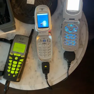 Sale Photo Thumbnail #97: Nostalgic, working cell phones with boxes and chargers.