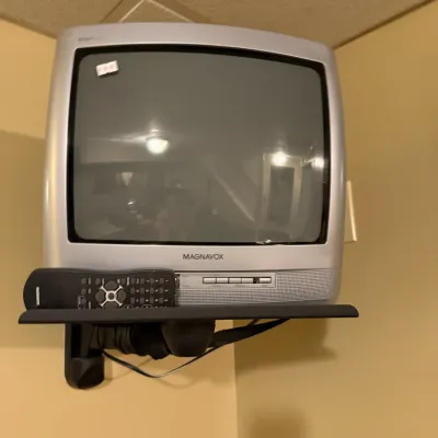 Sale Photo Thumbnail #182: Small Magnavox TV set with remote