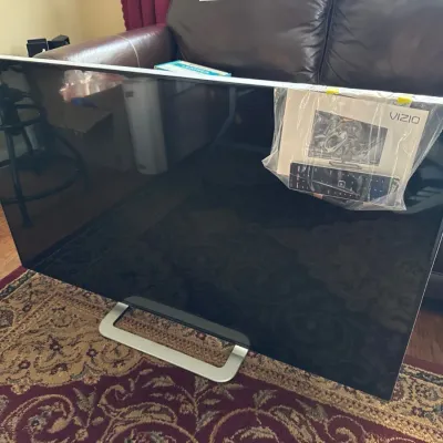 Sale Photo Thumbnail #33: 55" 3D Vizio TV with blueray player, 3D movies, and 3D glasses.