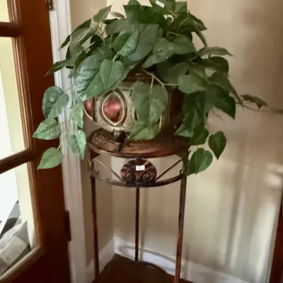 Sale Photo Thumbnail #177: Faux plant and vintage metal corner table.