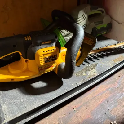 Sale Photo Thumbnail #329: DeWalt cordless hedge trimmer