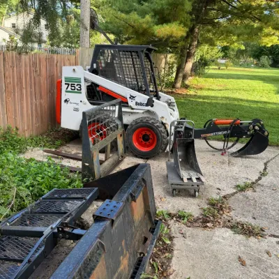 Sale Photo Thumbnail #117: Bobcat skidsteer  with tranching attachment