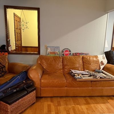 Sale Photo Thumbnail #115: Cognac brown leather sofa and matching armchair