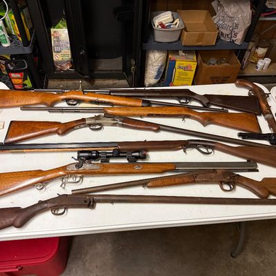 Sale Photo Thumbnail #2: Antique and vintage firearms, including long guns, rifles, and handguns.