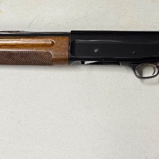 Sale Photo Thumbnail #22: Browning Auto-5 semi-automatic shotgun featuring a checkering wood stock, ventilated rib barrel, and blue receiver.