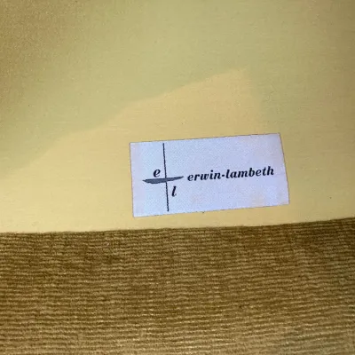 Sale Photo Thumbnail #56: Original Erwin-Lambeth manufacturer's fabric tag on a piece of vintage corduroy-upholstered furniture.