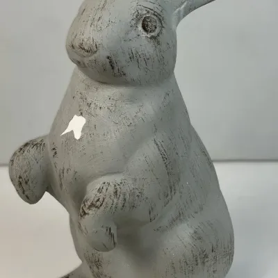 Sale Photo Thumbnail #106: Distressed grey rabbit figurine in a standing position, showing minor paint chipping on the chest.