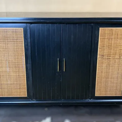 Sale Photo Thumbnail #54: Vintage black wooden stereo console with woven cane speaker grilles and center cabinet doors, circa 1960s.