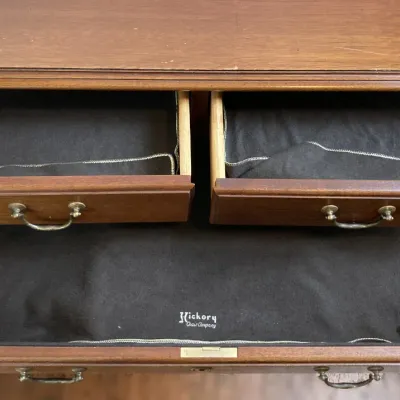 Sale Photo Thumbnail #29: Hickory Chair Company wooden chest with open felt-lined drawers and brass hardware, showing light surface wear.