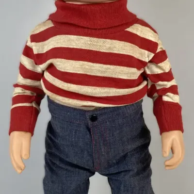 Sale Photo Thumbnail #122: Vintage 1960s Mattel 'Speedy' doll featuring a freckled face, blue baseball cap, red-and-white striped turtleneck, and denim pants.