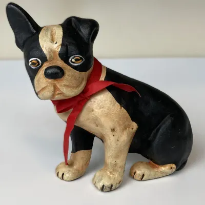 Sale Photo Thumbnail #26: Vintage painted cast iron Boston Terrier doorstop or figurine featuring a red ribbon accent around its neck.