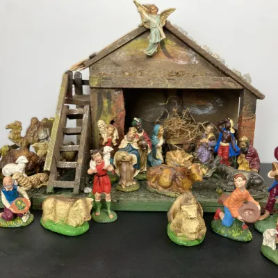Sale Photo Thumbnail #201: Vintage painted nativity set featuring a wooden stable, various figurines, wise men, and livestock.