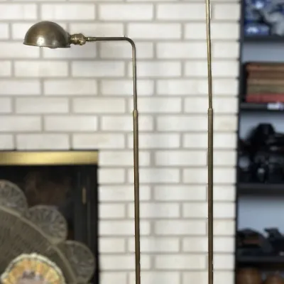 Sale Photo Thumbnail #98: Pair of vintage brass pharmacy floor lamps with adjustable gooseneck arms and dome shades.