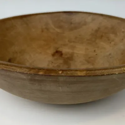 Sale Photo Thumbnail #27: Hand-turned wooden dough bowl with a natural finish, showing light wear consistent with age and use.