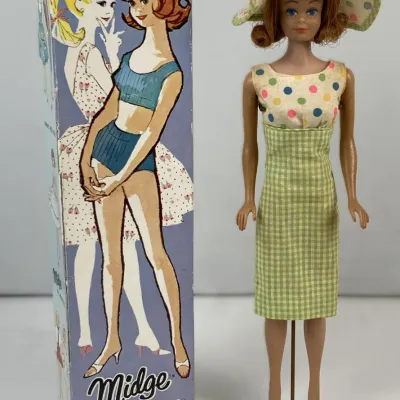 Sale Photo Thumbnail #114: Vintage 1960s Mattel Midge doll with original illustrated box, wearing a green gingham and polka dot dress with a matching wide-brim hat.