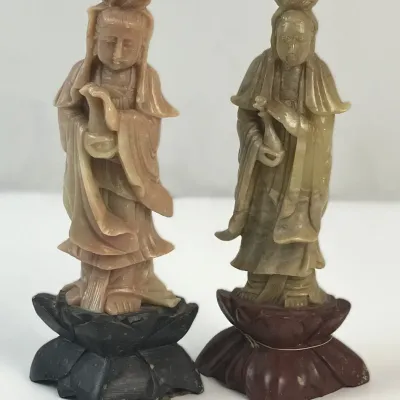 Sale Photo Thumbnail #128: Pair of vintage carved soapstone statues depicting Guanyin, each set on carved lotus bases.