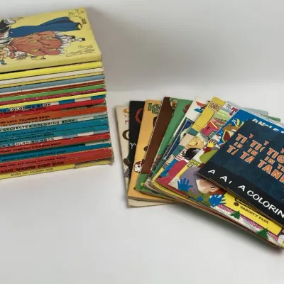 Sale Photo Thumbnail #187: Collection of vintage children's coloring and storybooks from the mid-20th century, including popular cartoon and advertising titles showing light wear.