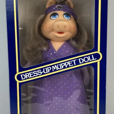 Sale Photo Thumbnail #120: Vintage Fisher-Price Miss Piggy Dress-Up Muppet doll, brand new in its original packaging.