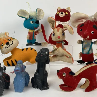 Sale Photo Thumbnail #140: Collection of vintage mid-century novelty toys and figurines, including Dream Pets plush animals and plastic poodle figures.