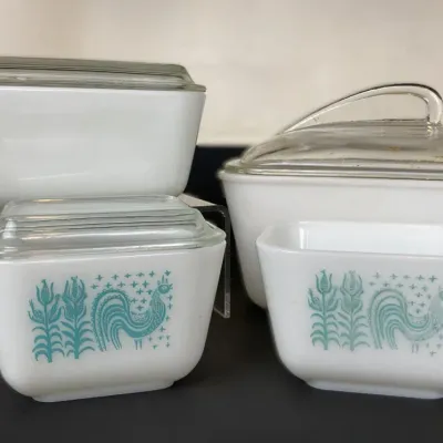 Sale Photo Thumbnail #18: Vintage Pyrex Butterprint pattern refrigerator dish set with clear glass lids.