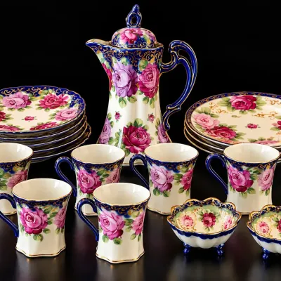 Charming estate collection of 14 assorted vintage-style porcelain and decorative glass pieces featur