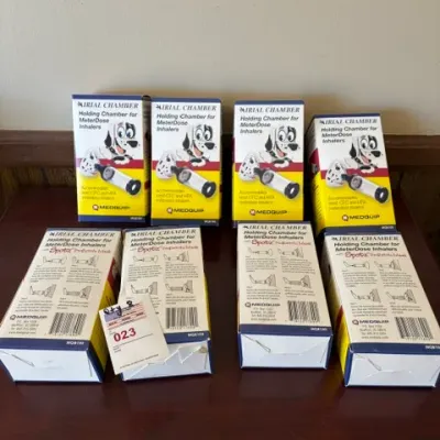 Lot of eight new-in-box Medquip Airial Chamber holding chambers for meter-dose inhalers with pediatric masks.