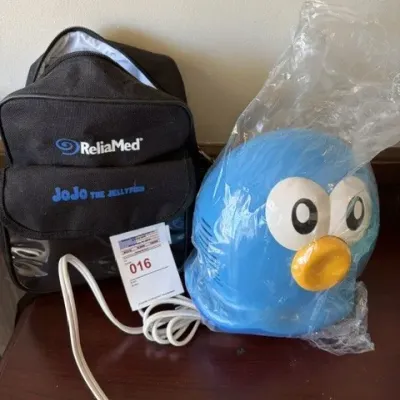 ReliaMed 'JoJo the Jellyfish' pediatric compressor nebulizer system, complete with a blue character-shaped compressor unit in...