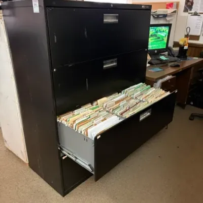Large black four-drawer lateral filing cabinet 