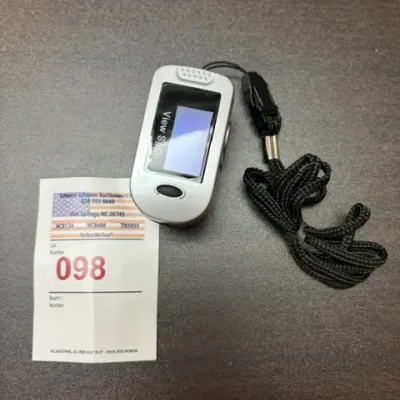 ViewSpO2 portable fingertip pulse oximeter with an attached black lanyard.