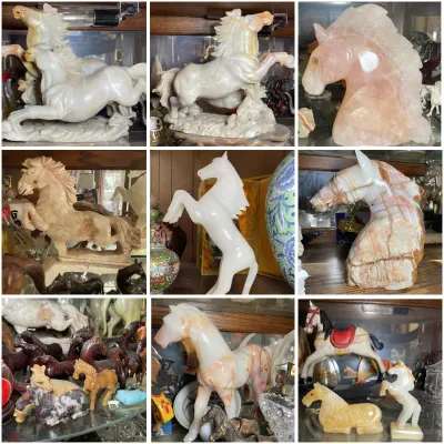 Sale Photo Thumbnail #193: Collection of carved stone horse figurines and bookends, featuring materials such as jade, rose quartz, onyx, and alabaster.