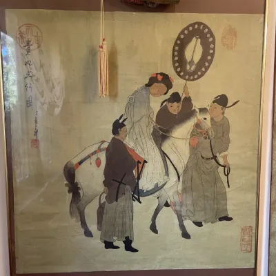 Sale Photo Thumbnail #148: Framed Chinese style painting depicting figures with a horse, featuring calligraphy and red artist seals.