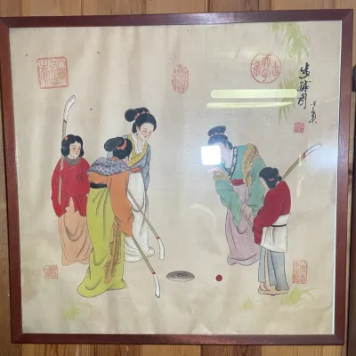 Sale Photo Thumbnail #43: Framed Asian watercolor artwork on silk or paper depicting figures playing Chuiwan, featuring traditional red chop stamps and calligraphy in a square wooden frame.