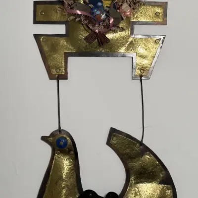 Sale Photo Thumbnail #66: Vintage brass and copper bird-themed wall hanging decorated with a heart-shaped dried flower wreath and pink ribbon.