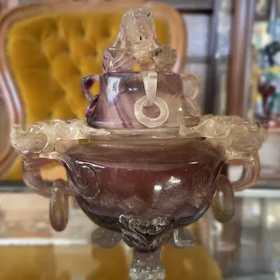 Sale Photo Thumbnail #6: Hand-carved purple fluorite or quartz incense burner, featuring carved dragon handles with loose ring details and a Foo dog finial lid.