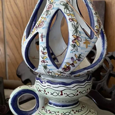 Sale Photo Thumbnail #17: Hand-painted Spanish or Mediterranean-style majolica ceramic hurricane lamp or fragrance warmer, featuring pierced reticulated openwork and colorful floral motifs.