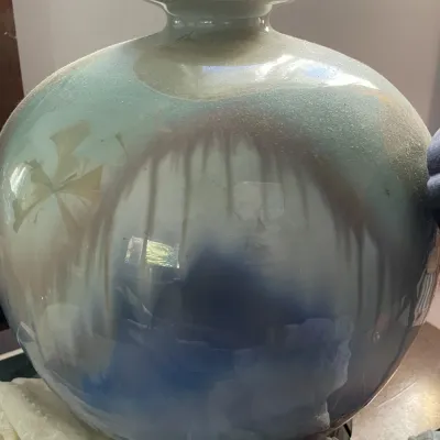 Sale Photo Thumbnail #109: Large globular art pottery vase with a crystalline and drip glaze design in tones of blue, beige, and white.