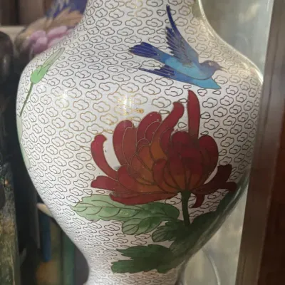 Sale Photo Thumbnail #186: Vintage Chinese cloisonné brass vase featuring floral and bird motifs over a white brass-wire background with decorative borders at the neck.