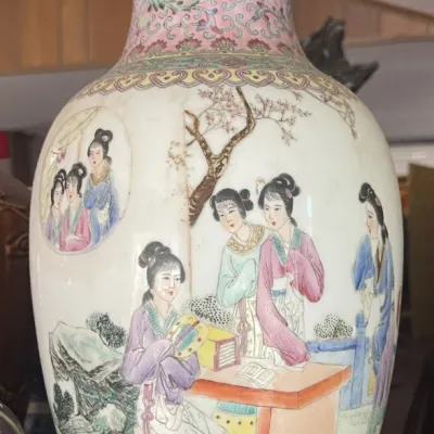 Sale Photo Thumbnail #170: Chinese porcelain vase featuring hand-painted scenes of court ladies in a garden setting, with a floral pink sgraffito neck.