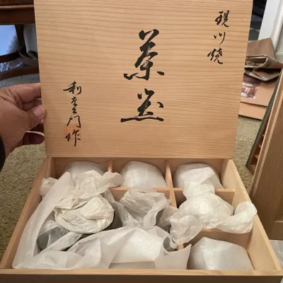 Sale Photo Thumbnail #85: Japanese tea set packaged in an original wooden tomobako storage box with calligraphic markings.