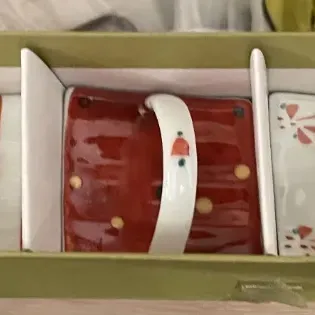 Sale Photo Thumbnail #92: Set of five contemporary hand-painted ceramic demitasse cups with saucers in their original boxed packaging.