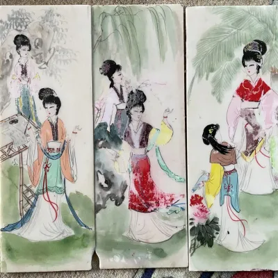 Sale Photo Thumbnail #97: Set of three vintage Chinese porcelain wall panels depicting court ladies in traditional robes against naturalistic garden backdrops.