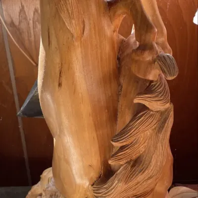 Sale Photo Thumbnail #28: Hand-carved wooden statue of rearing horses set on a rustic burl base.